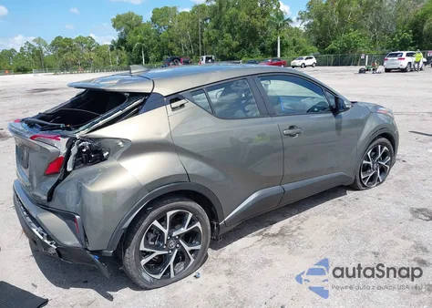 2021 Toyota C-Hr Xle z USA, uszkodzony, nr VIN NMTKHMBX3MR138846